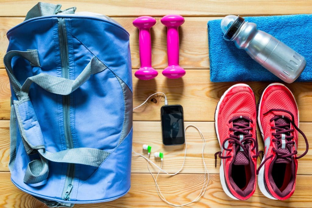 Gym bag with shoes, water bottle, and towel