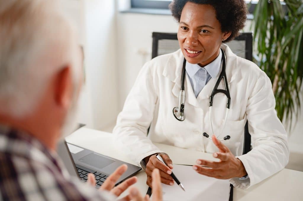 Doctor consulting patient about IBS and fiber use